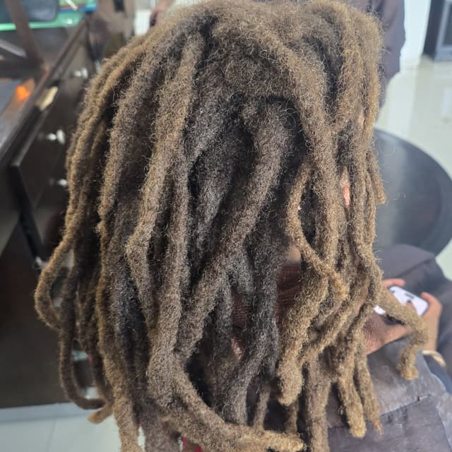 Loc Reset Package Luxe at Knotty Opulence Hair Care Studio in Merida, TX